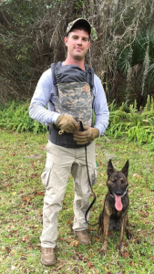 Taken after a successful tracking session with Scout, a Dutch Shepherd