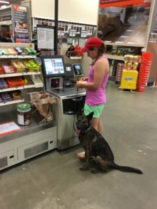 Ash and Scout checking out at Home Depot during a supply run